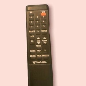 THAD-550A Universal Remote Control. Pre-Owned
